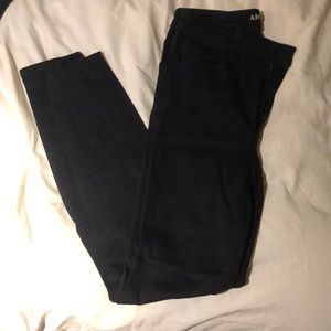 AE super high rise black jeans with knee rips